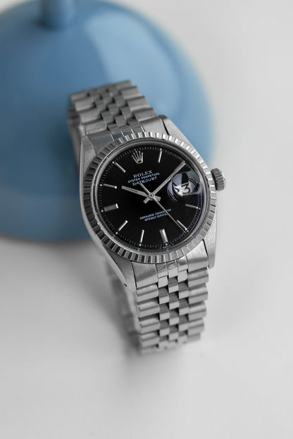 Rolex Datejust 36 cadran noir "open 6-9" ref.1603